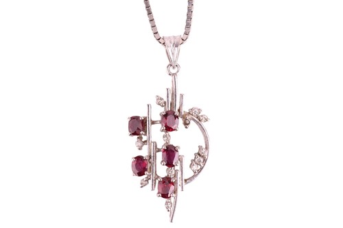 Lot 76 - A ruby and diamond pendant on chain, of...
