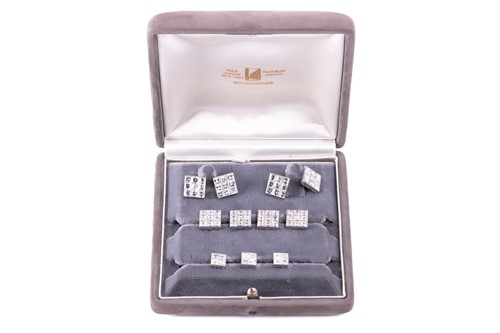 Lot 185 - Van Cleef & Arpels - a boxed diamond dress set,...