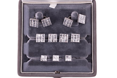 Lot 185 - Van Cleef & Arpels - a boxed diamond dress set,...