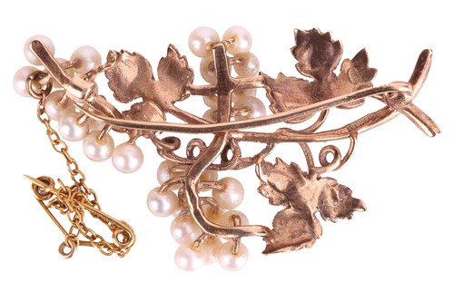 Lot 54 - A pearl-set vine brooch in 9ct gold, featuring...