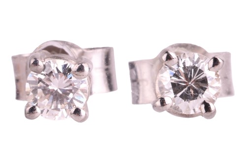 Lot 109 - A pair of diamond stud earrings, each earring...