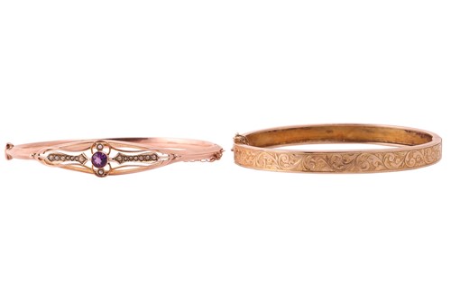 Lot 113 - Two hinged bracelets in 9ct gold; including a...