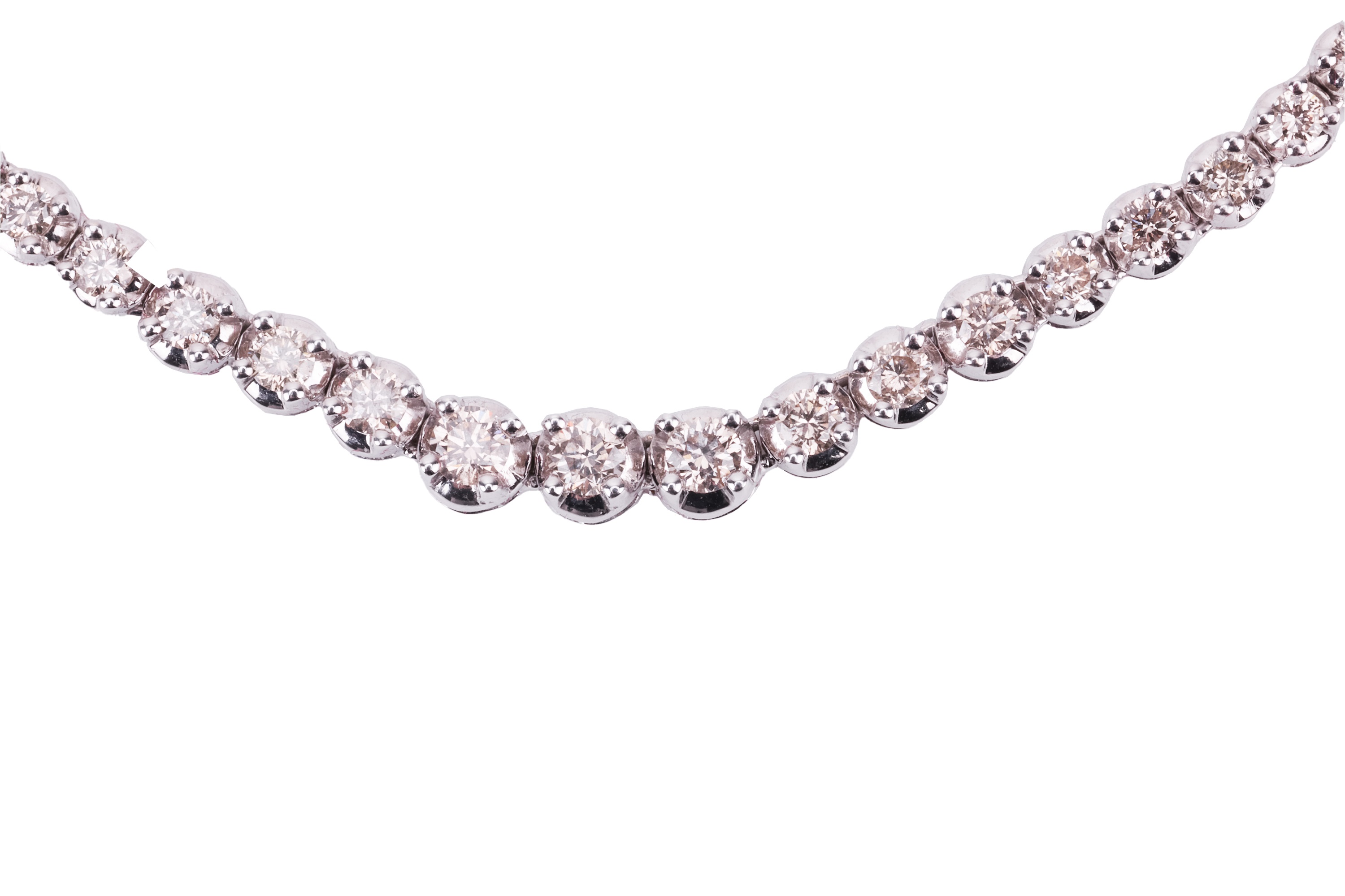 Lot 94 - A diamond line necklace set with a single row