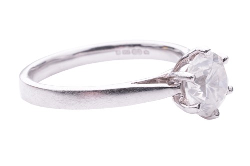 Lot 137 - A diamond solitaire ring in 18ct white gold,...