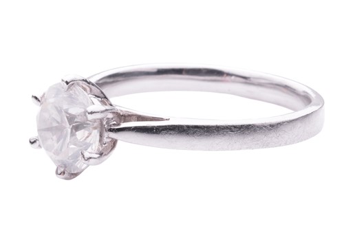 Lot 137 - A diamond solitaire ring in 18ct white gold,...