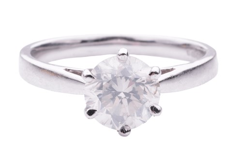 Lot 137 - A diamond solitaire ring in 18ct white gold,...