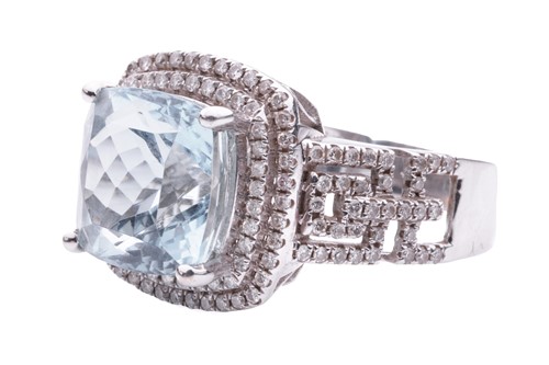 Lot 9 - An aquamarine and diamond cocktail ring in...