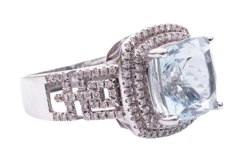 Lot 9 - An aquamarine and diamond cocktail ring in...