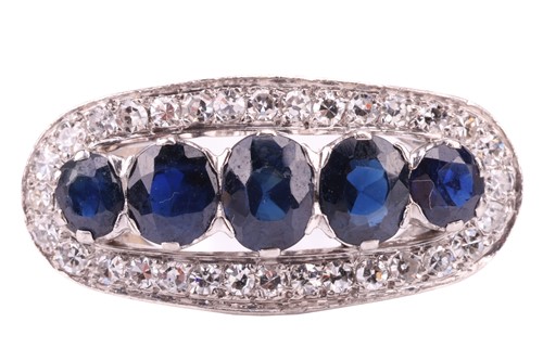 Lot 63 - A sapphire and diamond set dress ring, the...