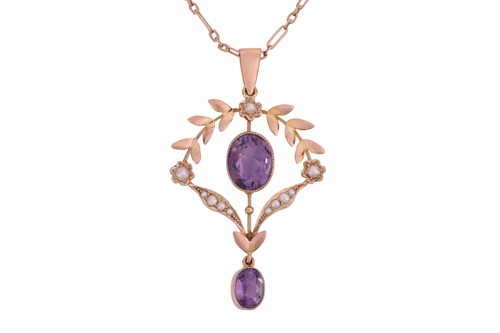 Lot 204 - An amethyst and seed pearl pendant featuring a...