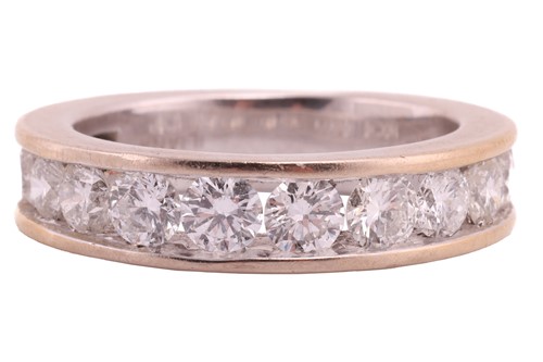 Lot 88 - A diamond half-eternity ring in 18ct gold,...