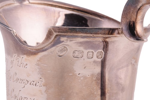 Lot 275 - A silver cream jug commemorating the 350th...
