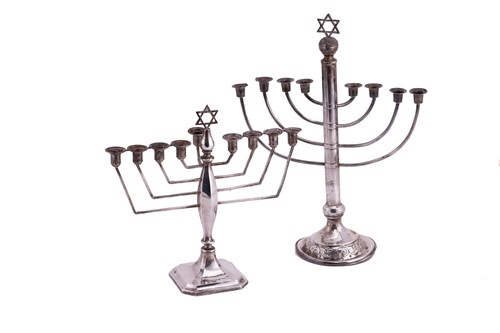 Lot 287 - A silver menorah with curved branches and...