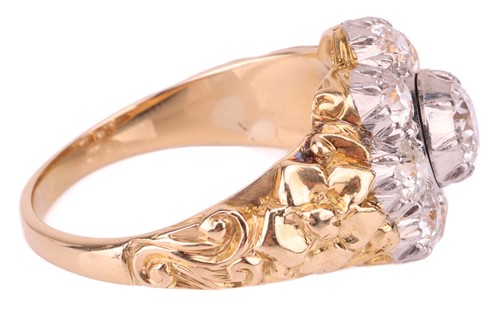 Lot 149 - A diamond cluster ring featuring an array of...