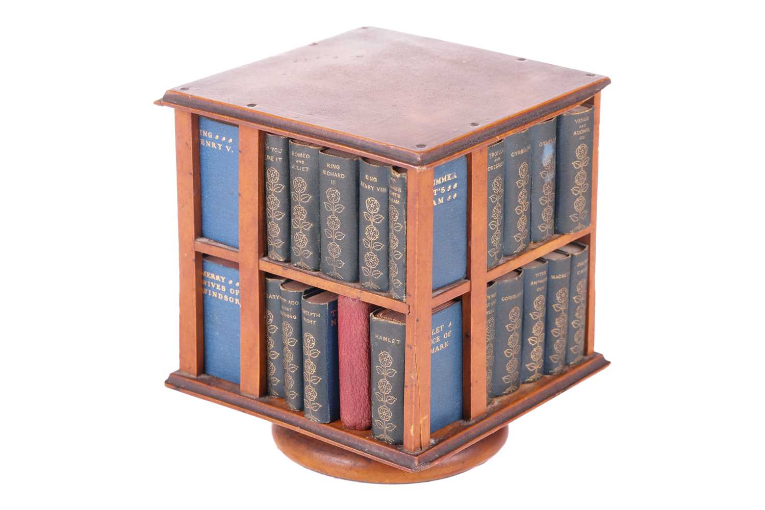 Lot 264 - An Edwardian satinwood miniature revolving