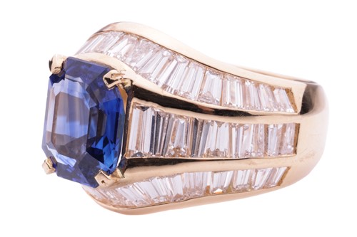 Lot 52 - A sapphire and diamond dress ring, the emerald...