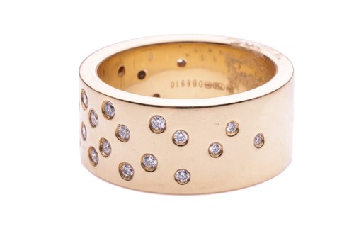 Lot 147 - De Beers - a diamond-set dress ring in 18ct...