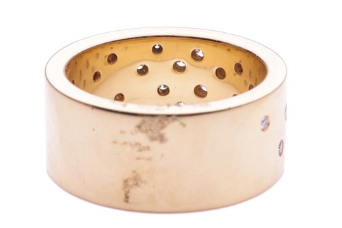 Lot 147 - De Beers - a diamond-set dress ring in 18ct...