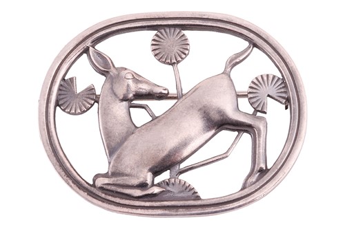 Lot 194 - Georg Jensen - a brooch depicting a kneeling...