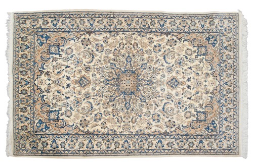 Lot 80 - An ivory ground Nain rug with formal bookcover...