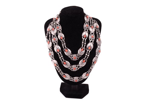 Lot 208 - Georg Jensen - a triple-strand floral necklace...