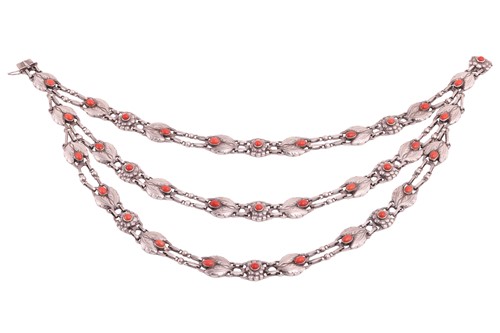 Lot 208 - Georg Jensen - a triple-strand floral necklace...