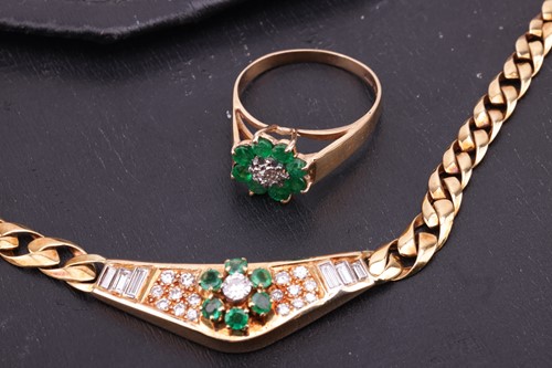 Lot 180 - An 18 carat gold, emerald and diamond set...