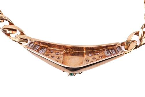 Lot 180 - An 18 carat gold, emerald and diamond set...