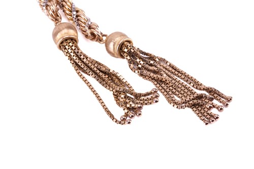 Lot 23 - A twisted roped lariat necklace in 9ct gold,...