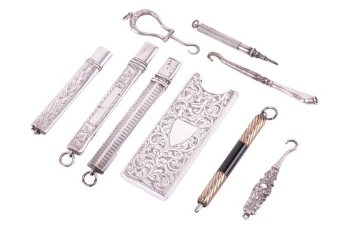Lot 194 - A collection of items including three silver...