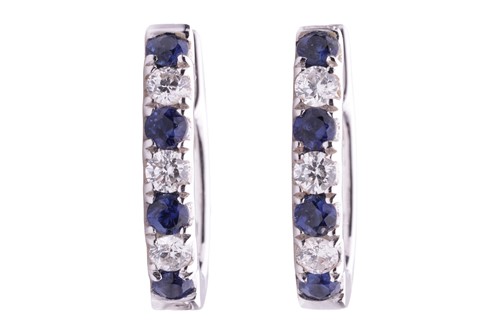 Lot 171 - A pair of diamond and sapphire set hoop...