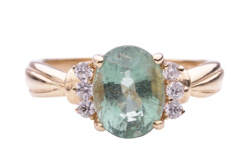 Lot 174 - A Paraiba tourmaline and diamond set ring,...