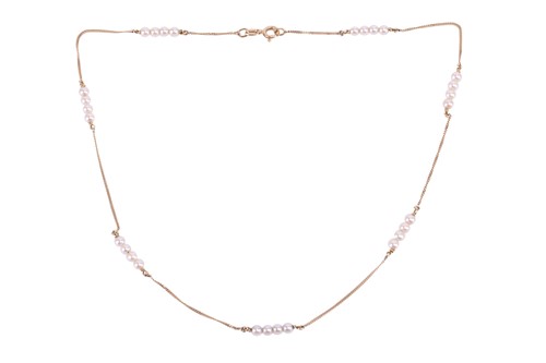 Lot 183 - A cultured pearl and chain necklace, with...
