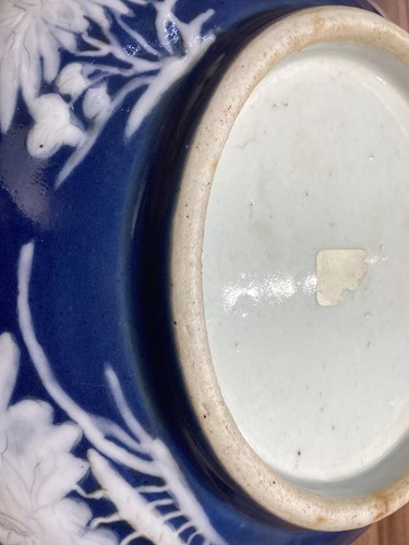 Lot 63 - A Chinese powder blue ground circular saucer...