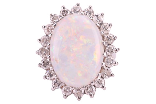 Lot 174 - An opal and diamond cluster ring, set with a...