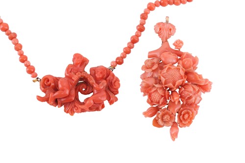 Lot 158 - A carved coral beaded necklace and a floral...