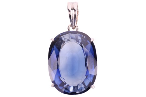 Lot 163 - A synthetic sapphire single stone pendant, the...