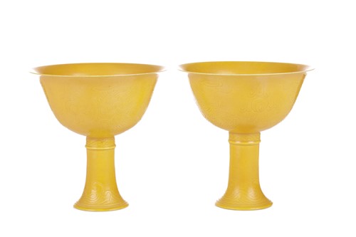 Lot 65 - A pair of Chinese yellow ground porcelain stem...
