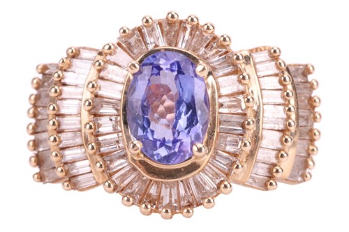 Lot 86 - A tanzanite and diamond dress ring, the...