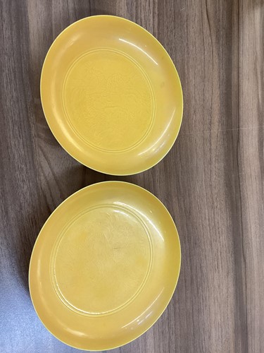 Lot 102 - A pair of Chinese yellow glazed Chinese...