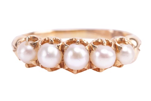 Lot 107 - A five stone pearl half hoop ring, the...