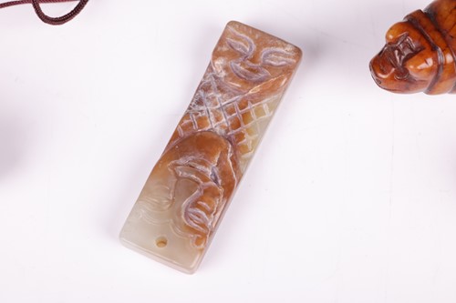 Lot 47 - A small collection of Chinese carved jade...
