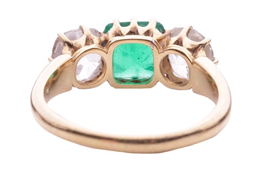 Lot 152 - An emerald and diamond three stone ring, the...