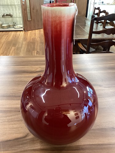 Lot 30 - A large Chinese Sang de Boeuf bottle vase,...