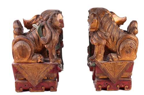Lot 35 - A large pair of Chinese red lacquered and...