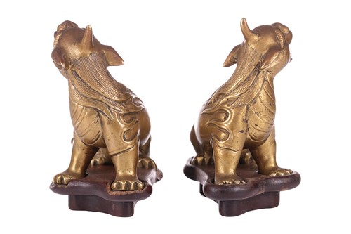 Lot 49 - A pair of Chinese, gilt bronze scholar's...