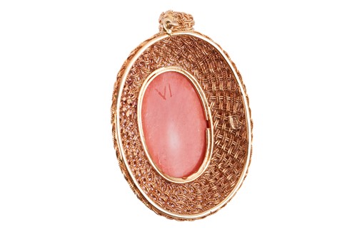 Lot 11 - A 19th century carved coral pendant, depicting...