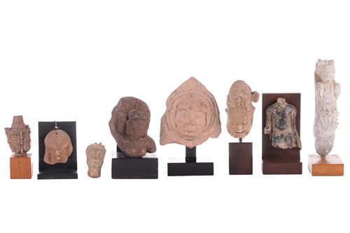Lot 73 - A group of Indian and other Asian stone...