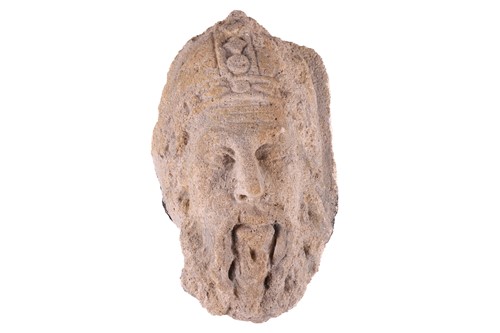 Lot 221 - A European carved stone architectural fragment;...