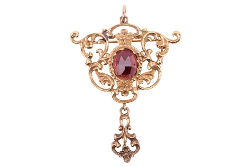 Lot 106 - A garnet pendant/brooch, set with a central...